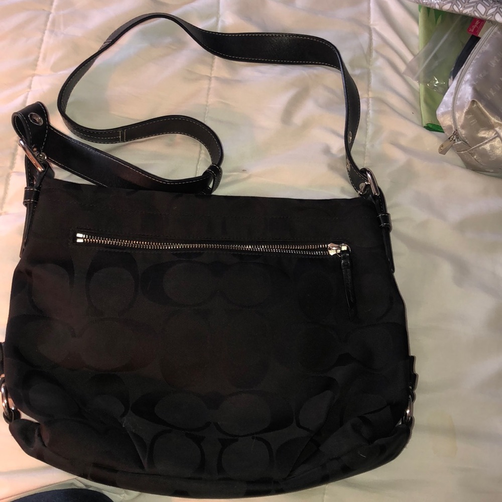 Coach - convertible over the shoulder/crossbody.